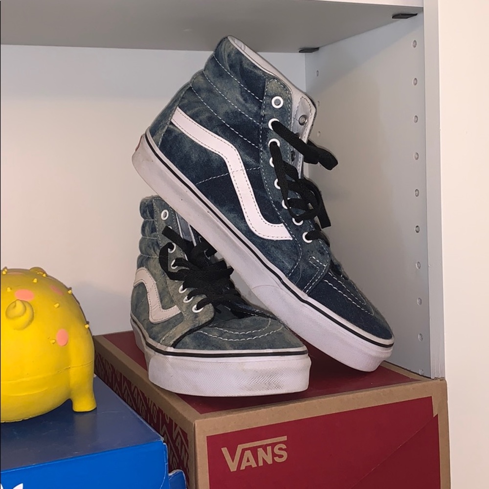 Blue and white high top vans